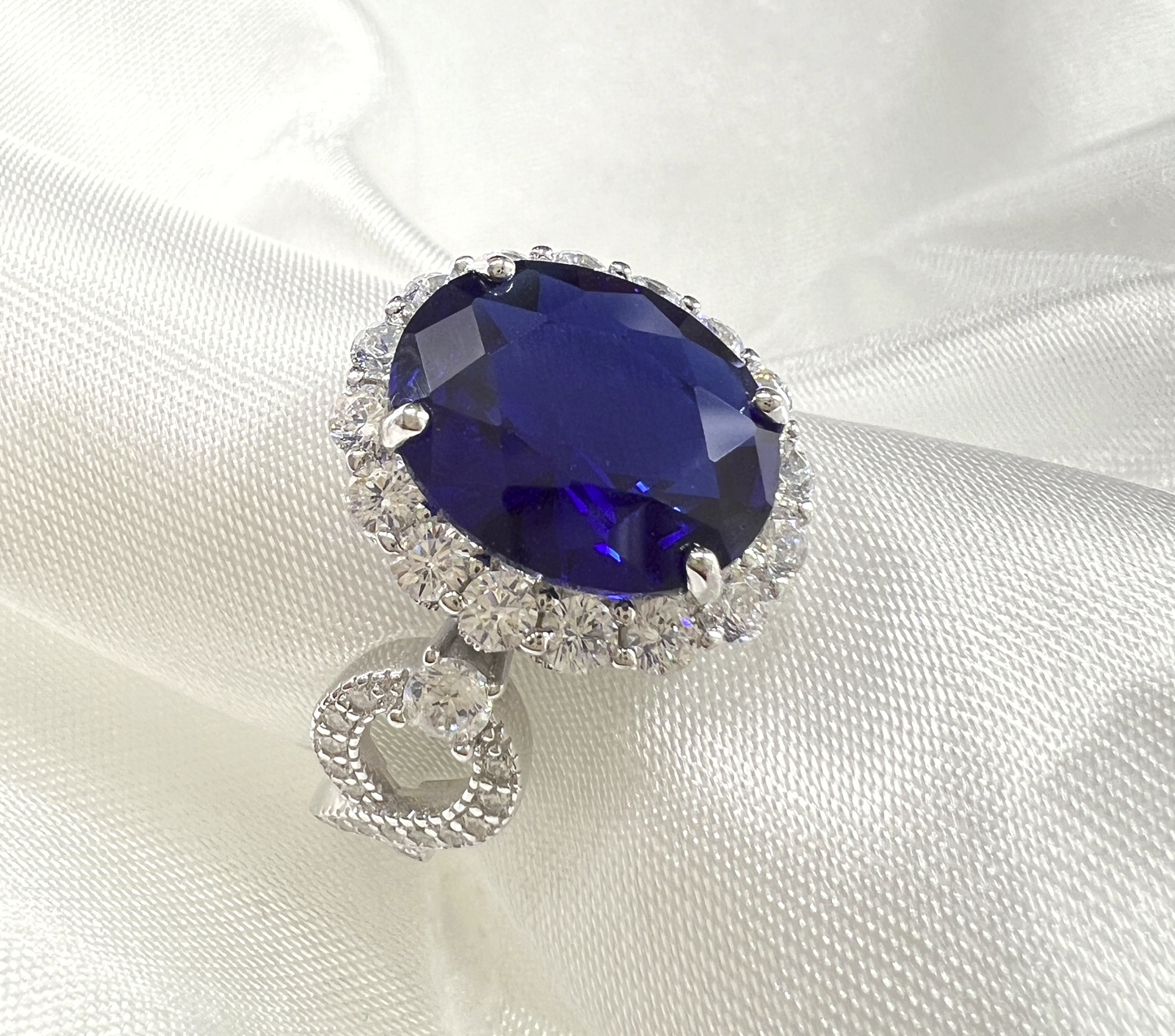 925 Sterling Silver Infinity Oval Cut Sapphire Blue CZ Ring