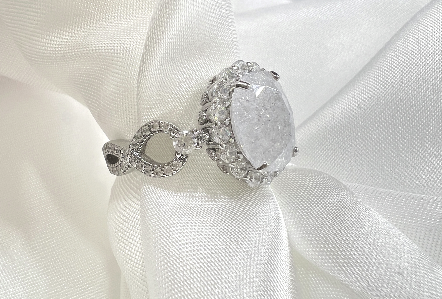 925 Sterling Silver Infinity Oval Cut White Ice & Diamond CZ Ring