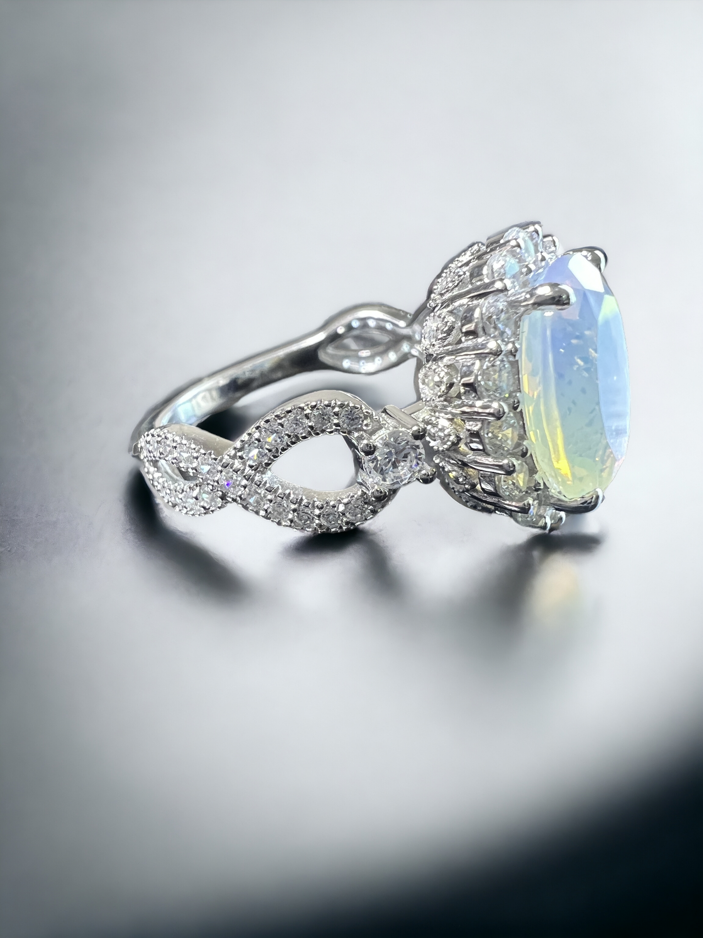 925 Sterling Silver Oval Cut White Multifaceted Moonstone Infinity Band Ring