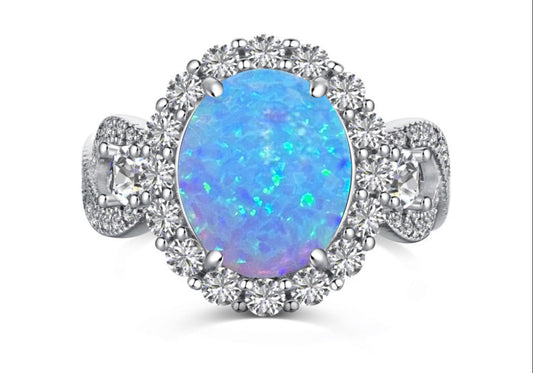 925 Sterling Silver Infinity Oval Cut Lab-Grown Blue Fire Opal & Diamond CZ